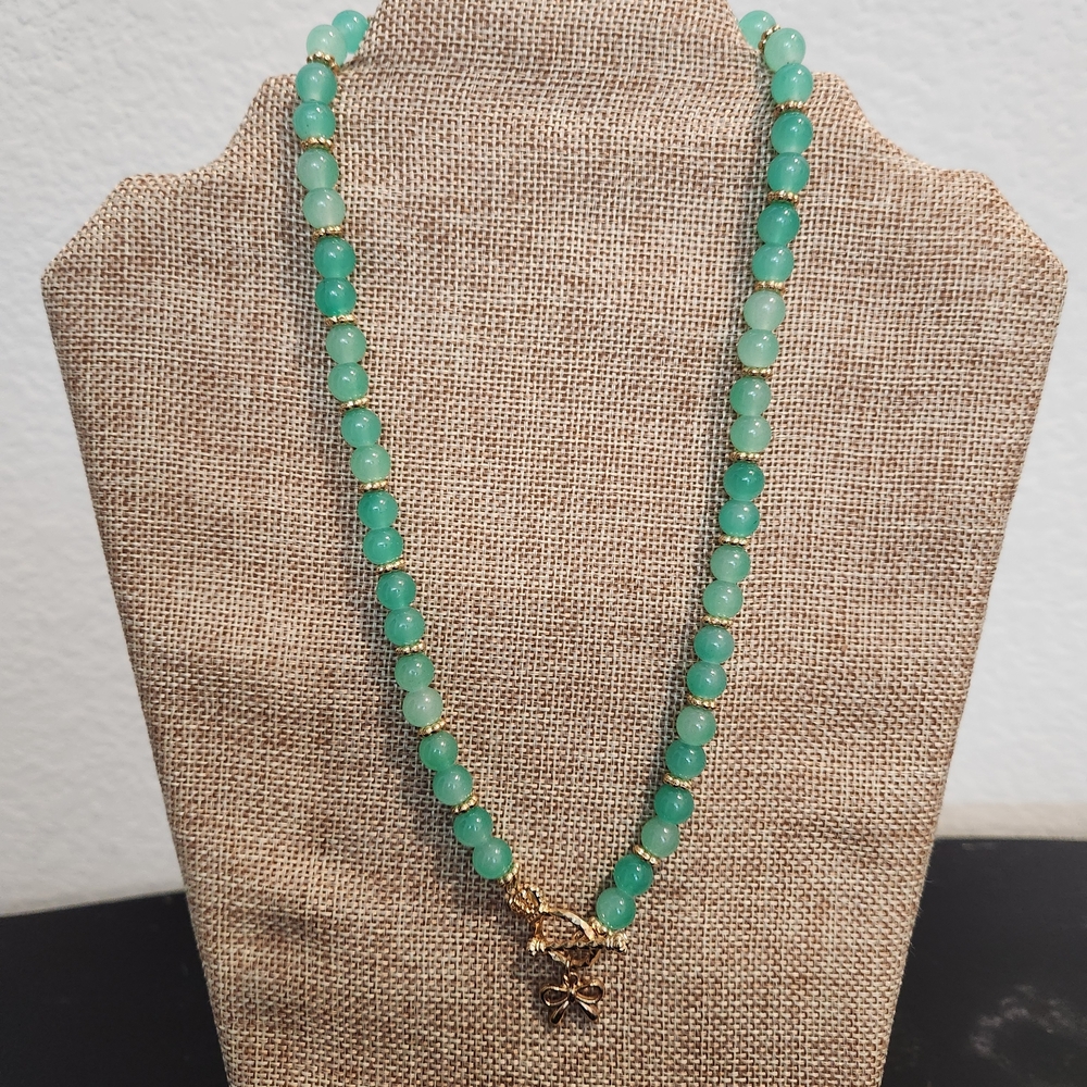Chic Green Beaded Necklace with Gold Floral Charm
